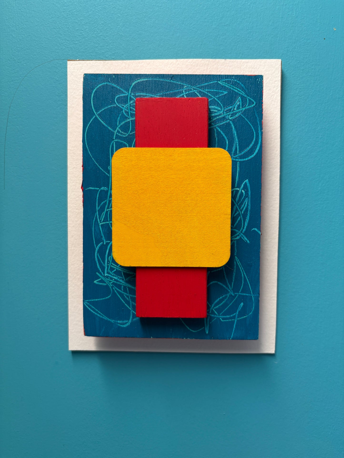 Mini Musings - Yellow Mellow by Nancy Benoy. Framed abstract art piece with colorful geometric shapes on an orange background . Nancy Benoy is a featured artist for SOCIAL SPACE I Holiday Market at MRKT Box - Strathcona Market location from November 14 - 16,2025